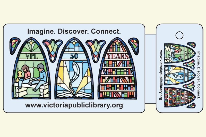 Library card featuring three stained glass windows with kids reading to dog, quill pin and bookshelf
